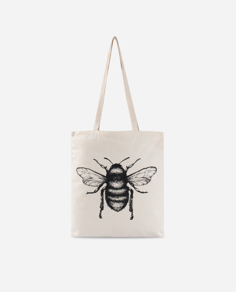 Natural cotton Manchester bee tote bag by The Sculpts with detailed black bee illustration on beige canvas
