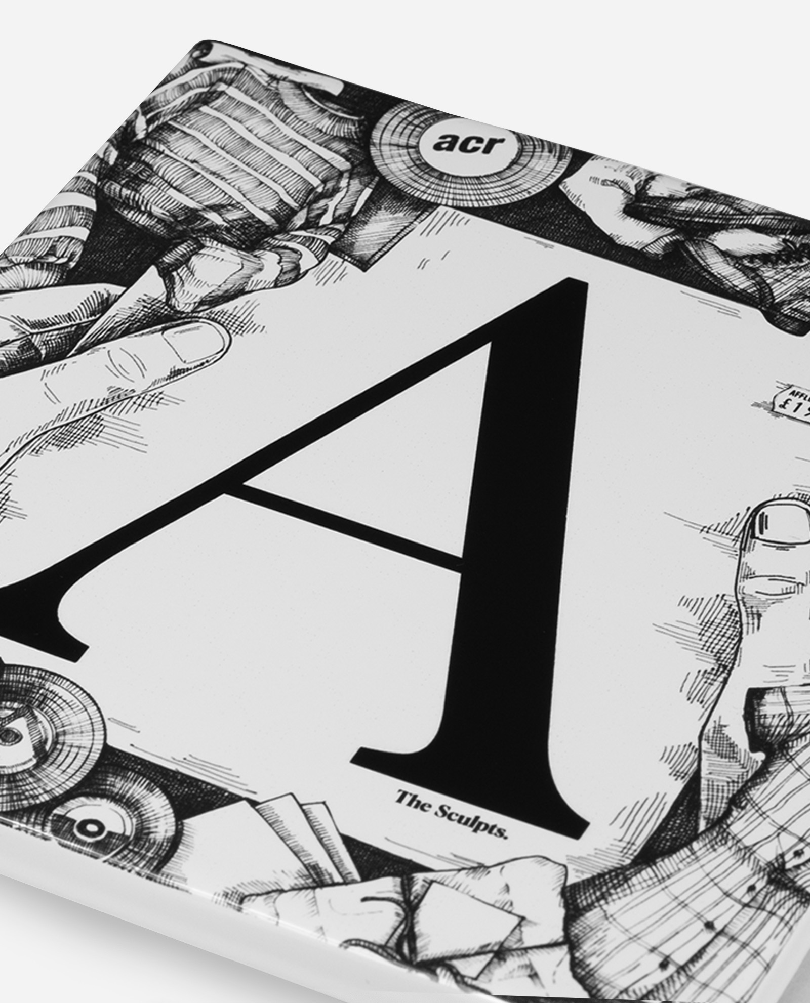 Close-up detail of Letter A and pen and ink illustrations on Affleck's Palace Manchester ceramic tile