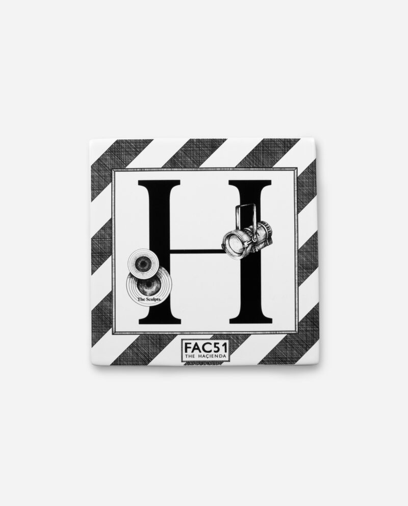 Hacienda tile Manchester letter H ceramic with black diagonal striped border and FAC51 branding on white background