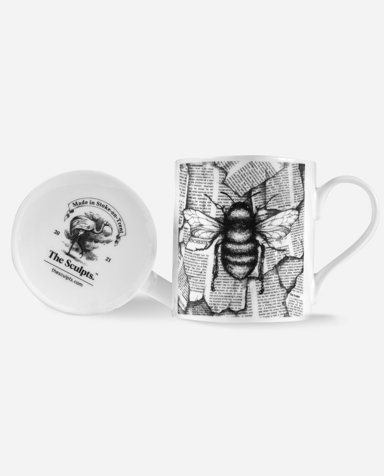 Manchester bee mug shown from side angle with base visible displaying 'Made in Stoke-on-Trent' and 'The Sculpts 2021' stamp