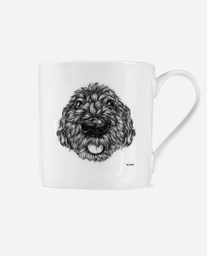 Cockapoo dog mug front view showing detailed black and white hand illustrated cockapoo portrait on white bone china
