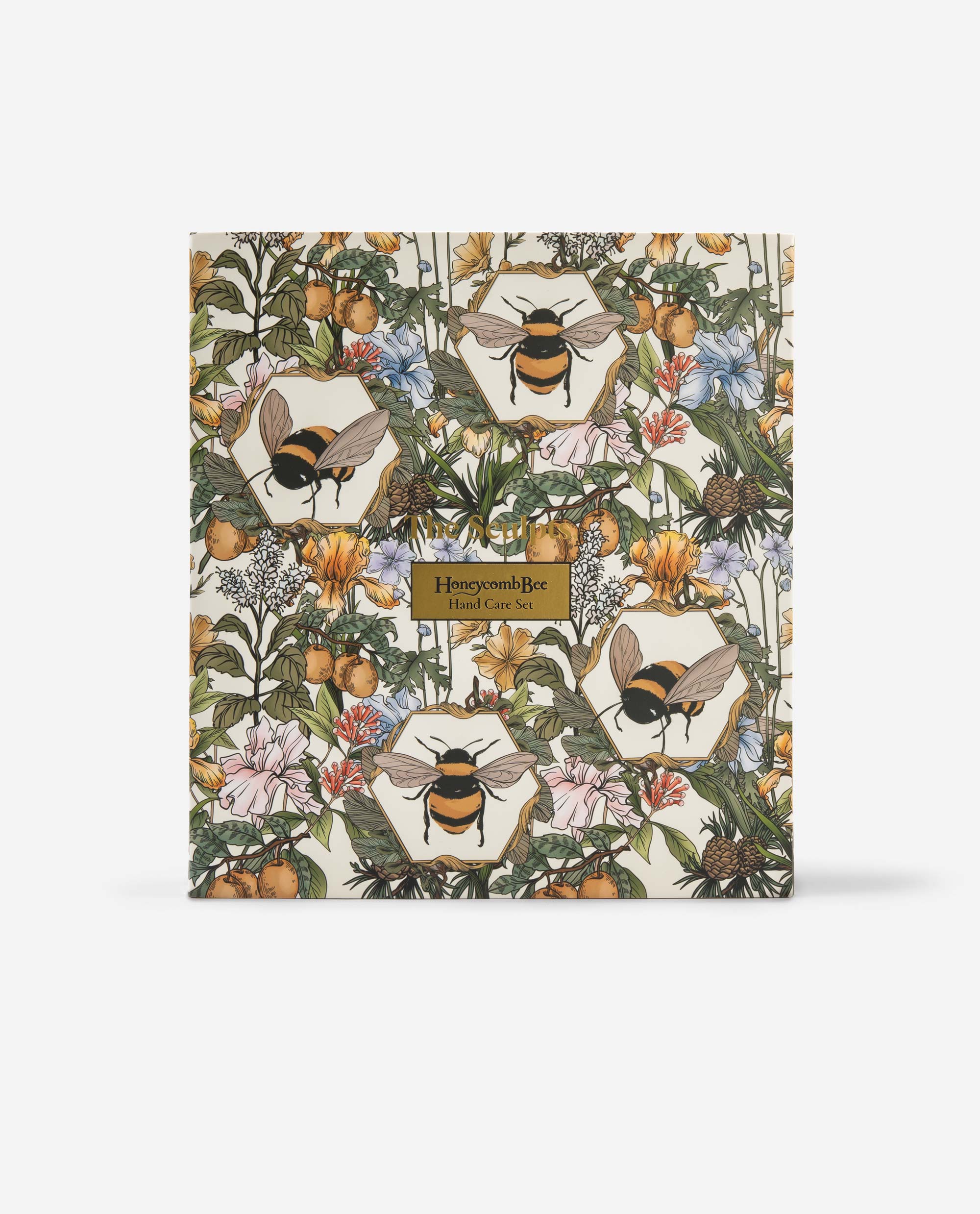 Honeycomb Bee hand care set packaging box featuring botanical illustration with bees, flowers and honeycomb pattern